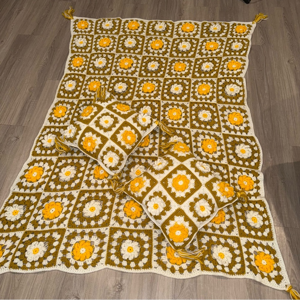 Crocheted blanket with 2 matching pillows, granny square motif